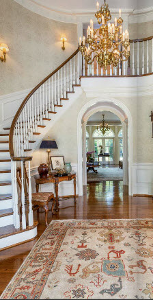 Greenville SC home custom curving staircase by Carver Group luxury homebuilder